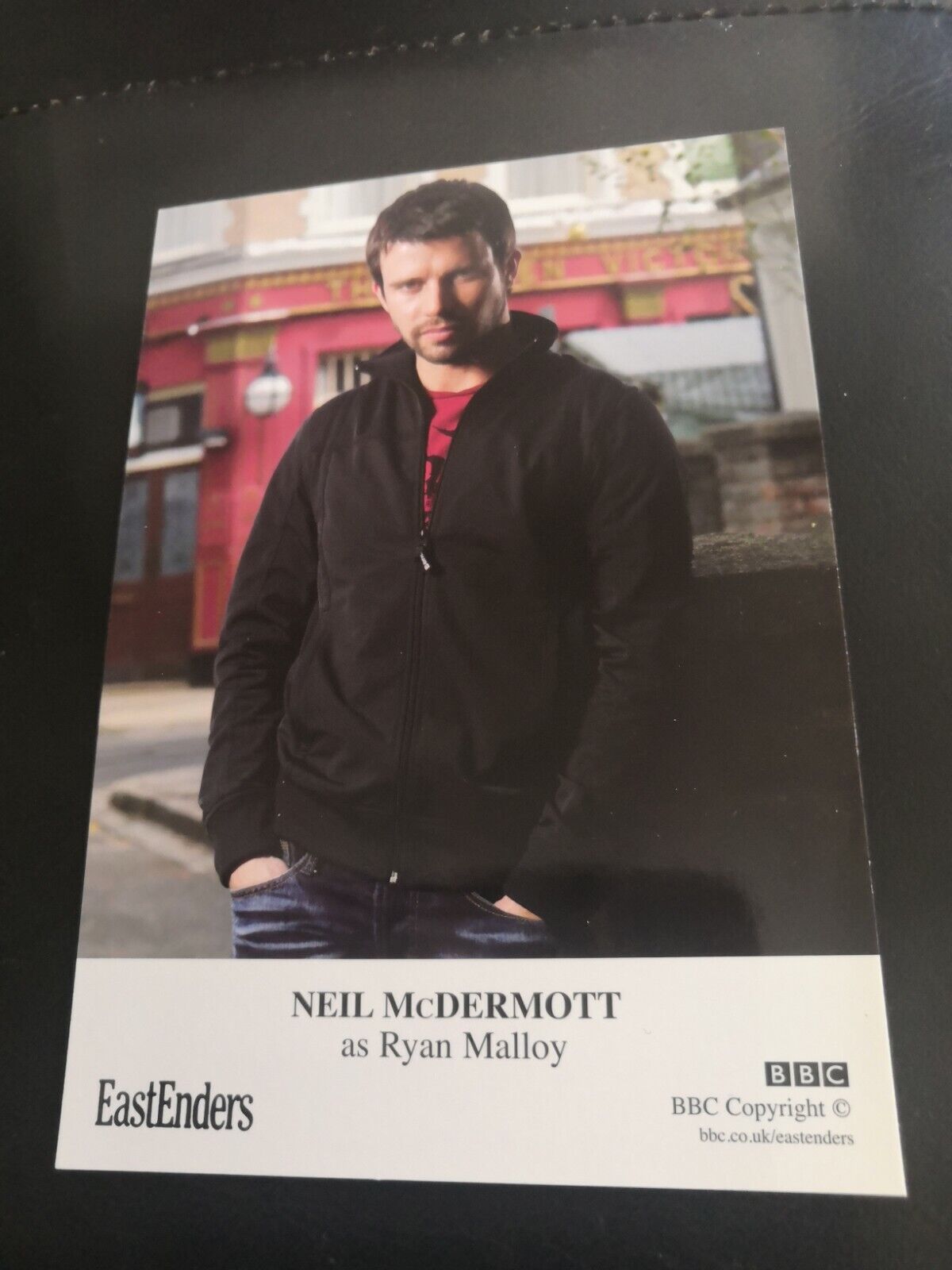 EASTENDERS UNSIGNED CAST CARD OF NEIL McDERMOTT