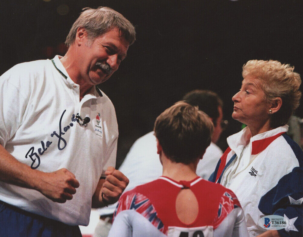 Autographed Bela Karolyi Signed Team Romania 8x10 Photo Poster painting Olympic Gymnastics Coach