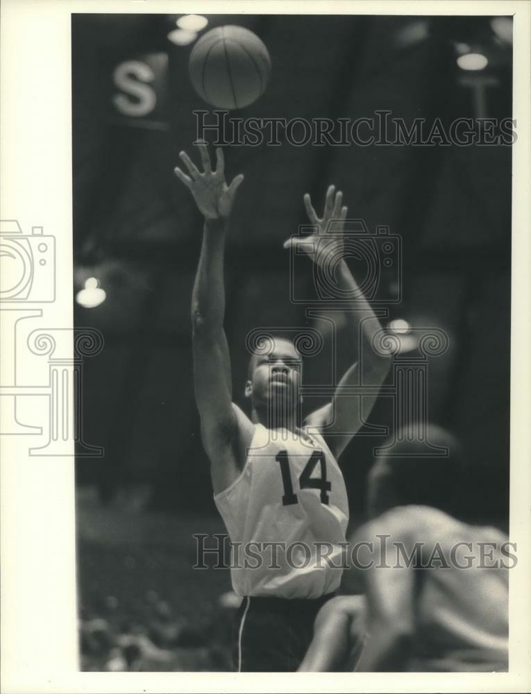 Press Photo Poster painting Basketball player #14 Vernon Asquath shoots ball over defenders