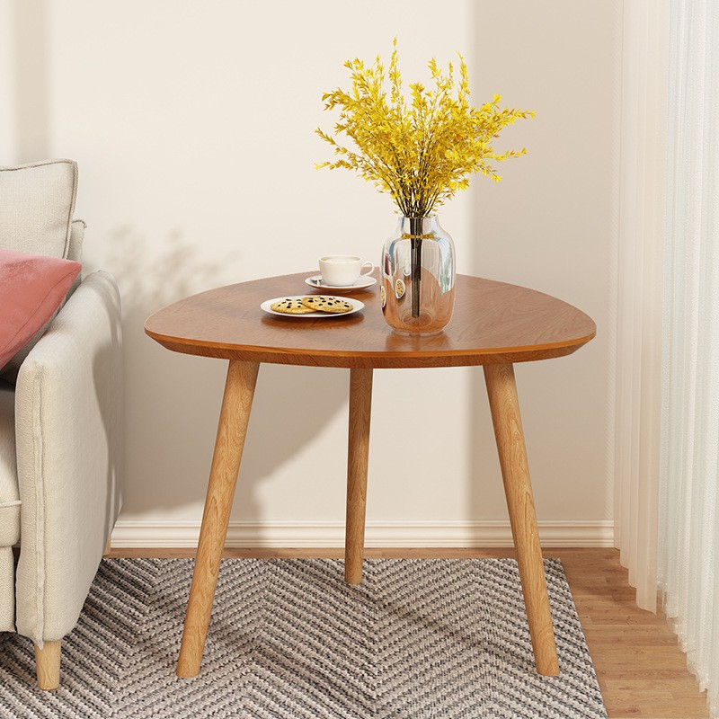 Detailed overview of a round wooden tea table and retro ring low table