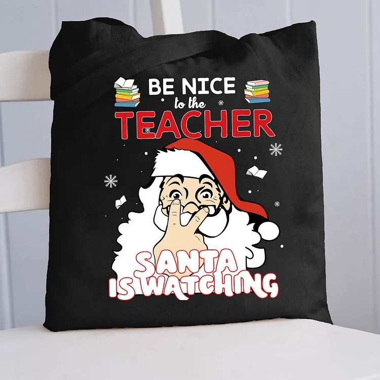 Pupiloves  Christmas Be Nice To The Teacher Santa Is Watching Tote Bag