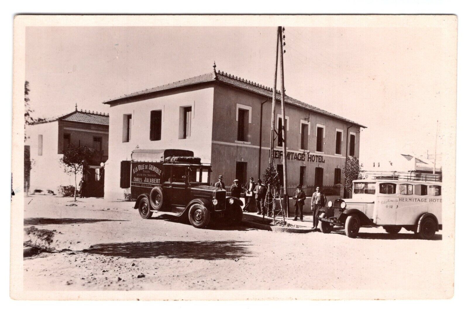 Early 1900's Hermitage Hotel Algiers with 2 Old Trucks Real Photo Poster painting RPPC Postcard