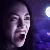 Crocs de vampire r&eacute;tractables pour Halloween