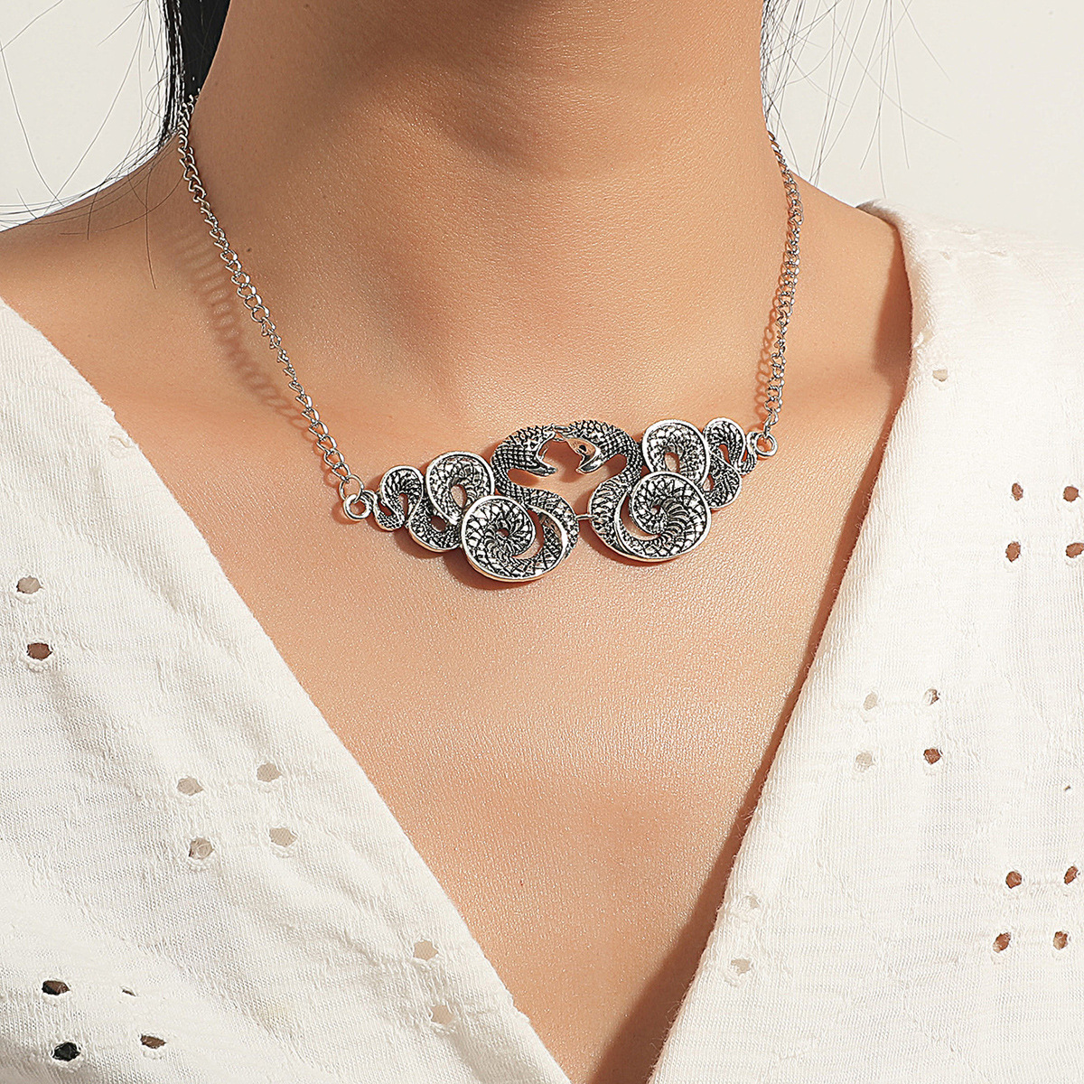 Winding snake pendant necklace