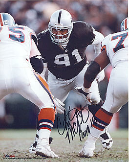 CHESTER MCGLOCKTON OAKLAND RAIDERS ACTION SIGNED 8x10