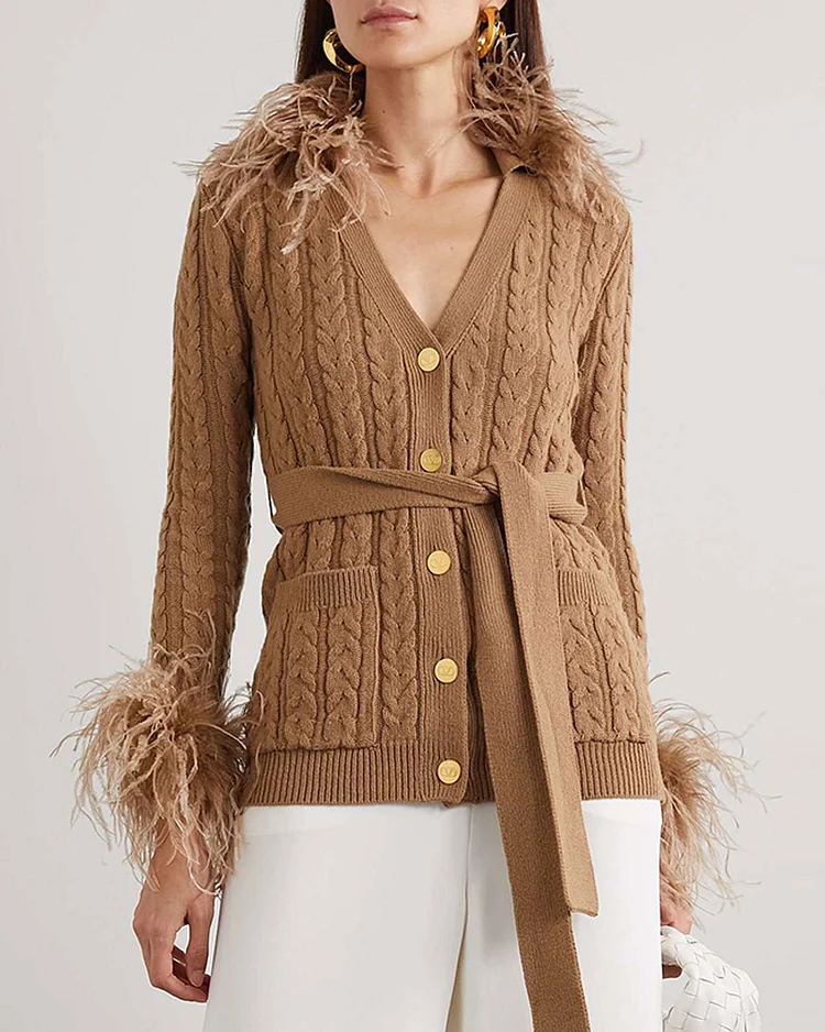 Belted feather-trimmed cable-knit wool cardigan