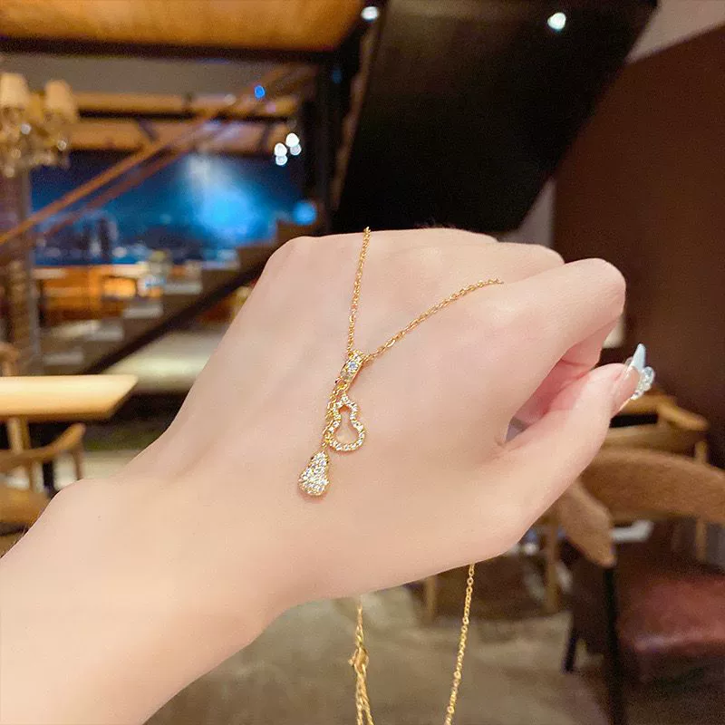 Double-layered, gold-plated brass, zircon, gourd, titanium, steel necklace.