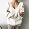 Sweater With Irregular Hem In Solid Color