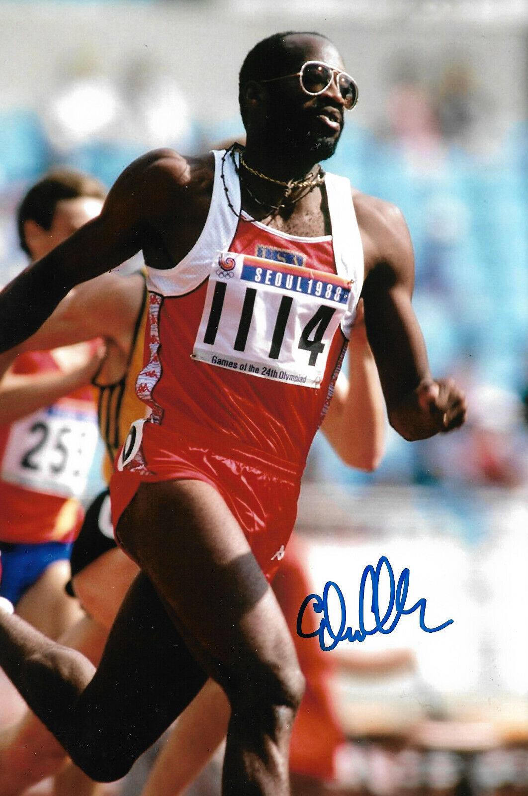 Edwin Moses signed 8x12 inch Photo Poster painting autograph