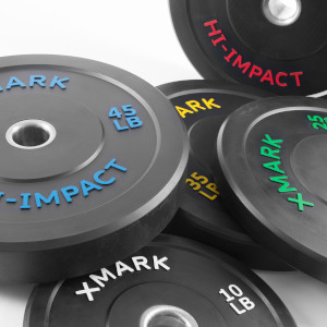 XMark Hi-Impact, dead bounce Olympic bumper weight plates, scattered, with variously colored texts