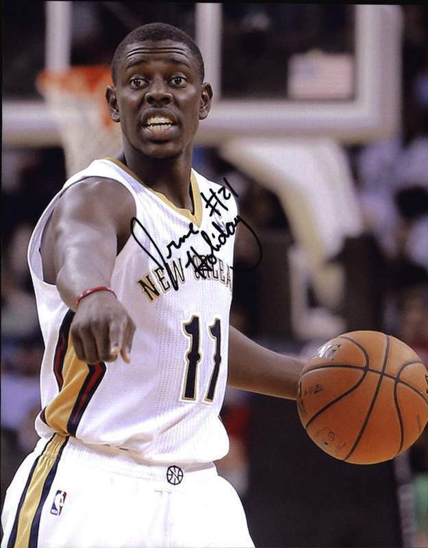 Jrue Holiday signed NBA basketball 8x10 Photo Poster painting W/Certificate Autographed 002