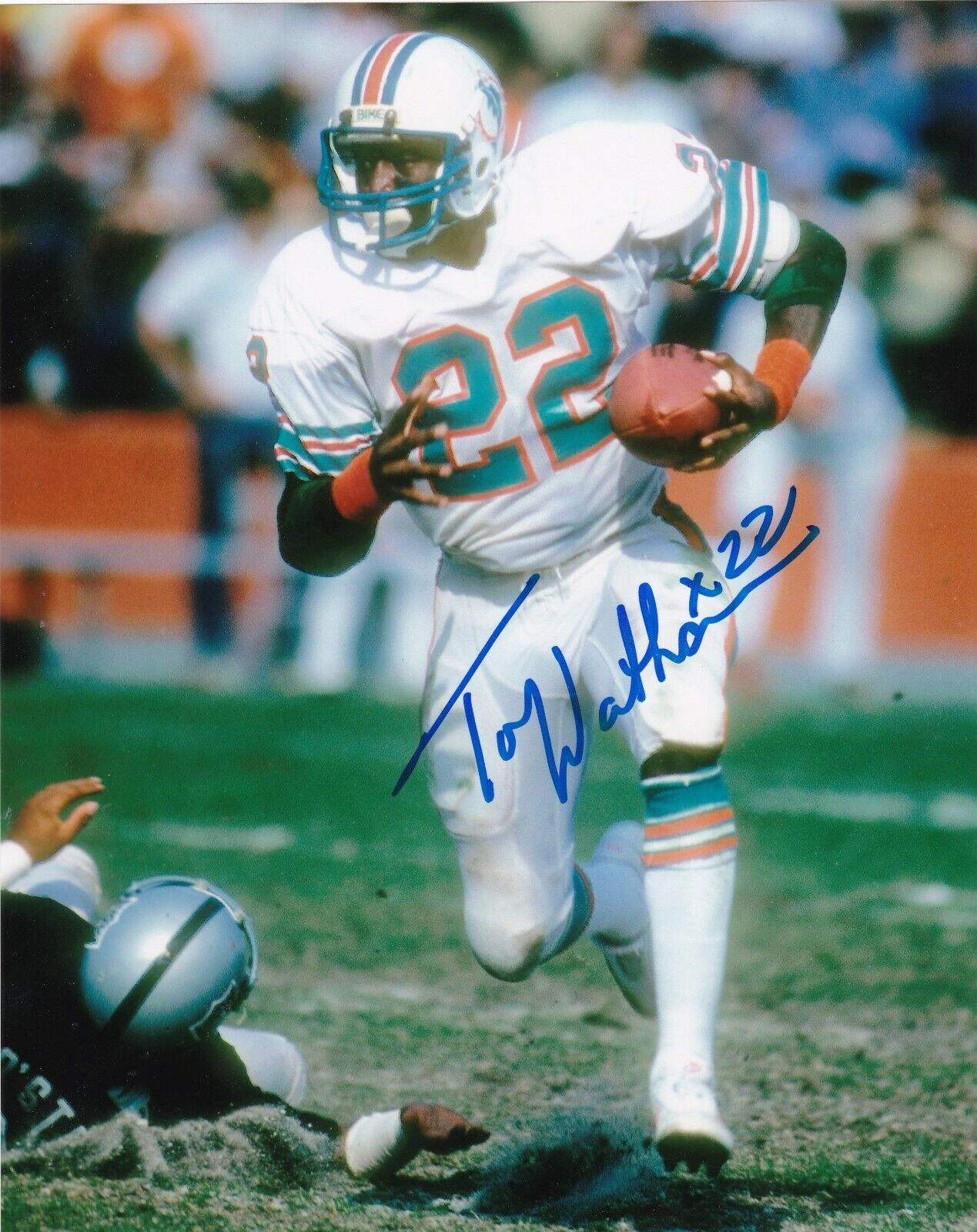 TONY NATHAN MIAMI DOLPHINS ACTION SIGNED 8x10