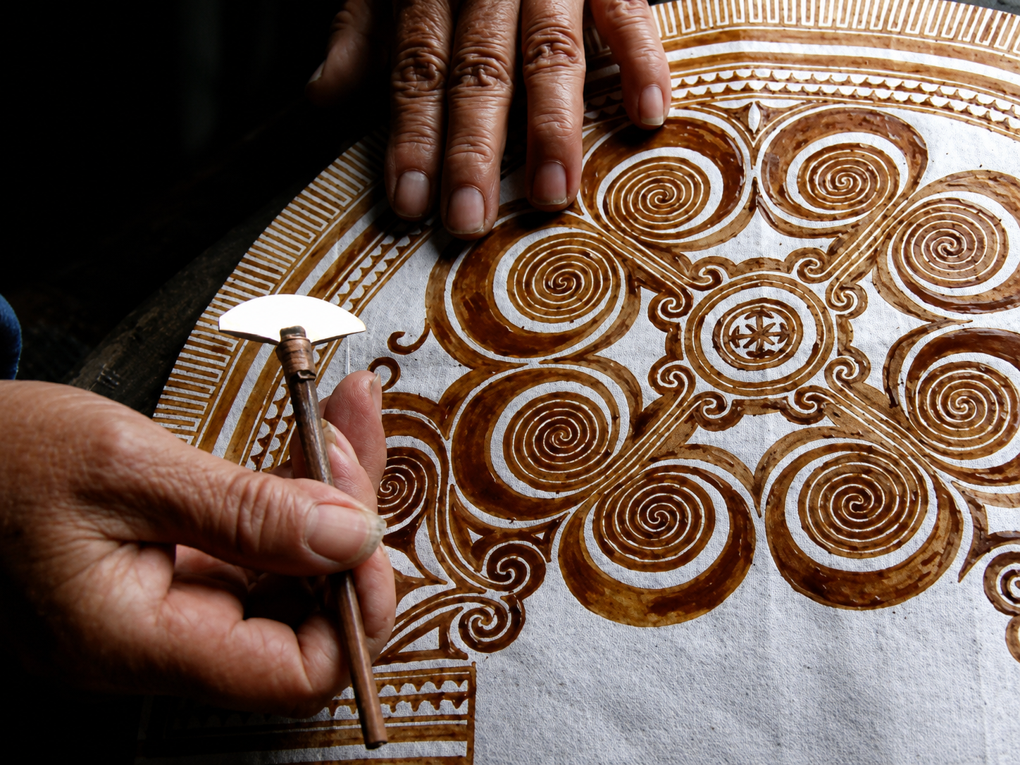 River and wave motifs in indigo batik