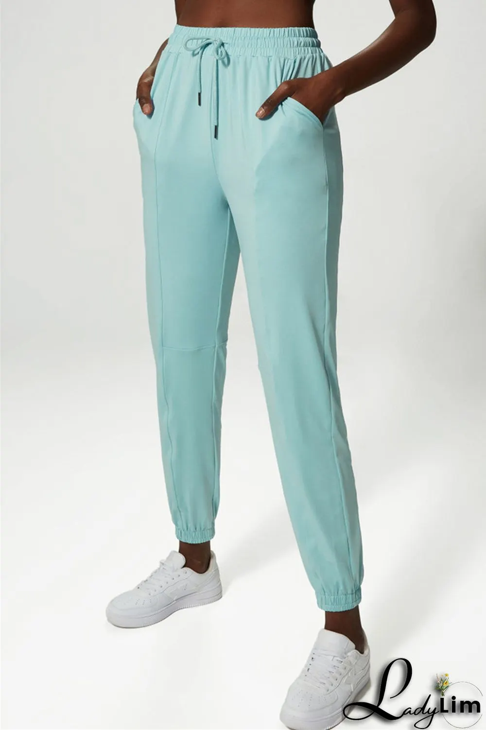 Apricot Casual Sportswear Solid Patchwork Regular High Waist Trousers