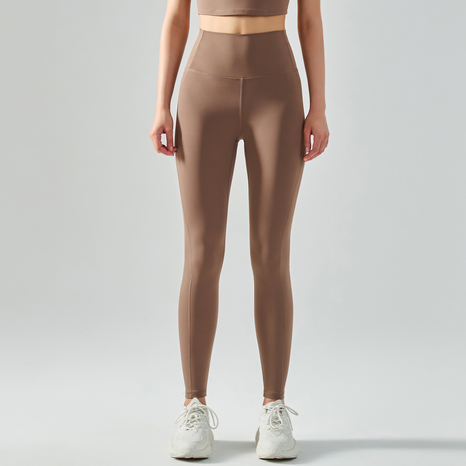 Buy different colors and types of women's mid strength side cross widened waist tummy control moisture wicking traceless sports tight capri leggings on Hergymclothing Chocolate