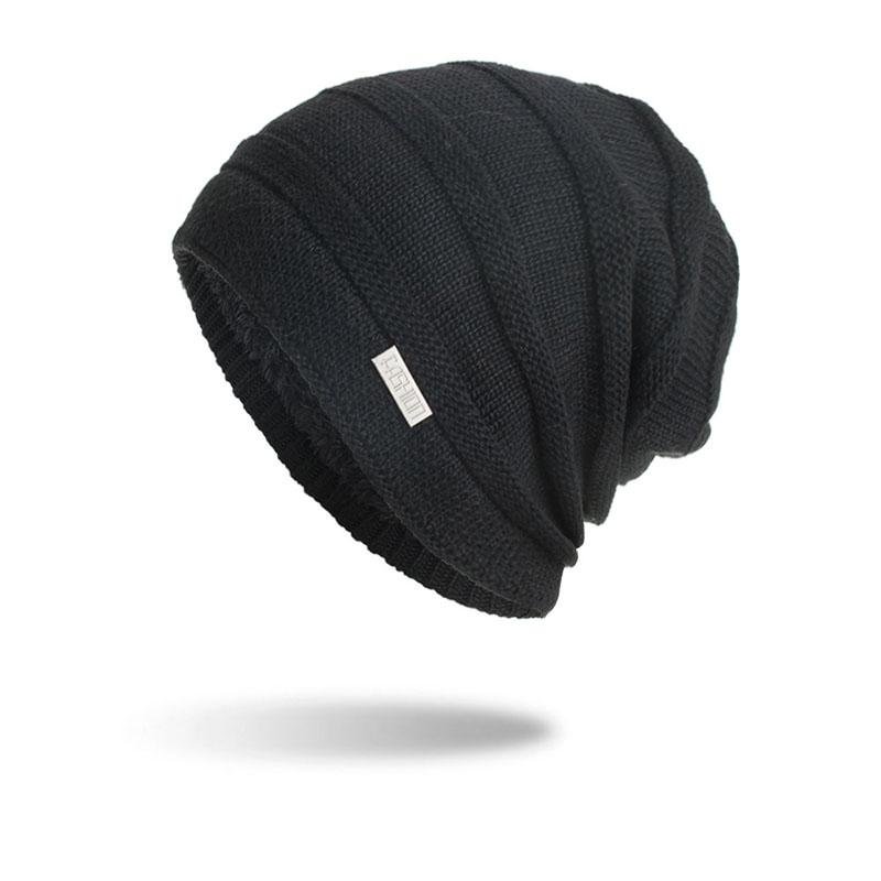 Knitted woolen cap with fleece and horizontal stripes and iron markings in  mildstyles