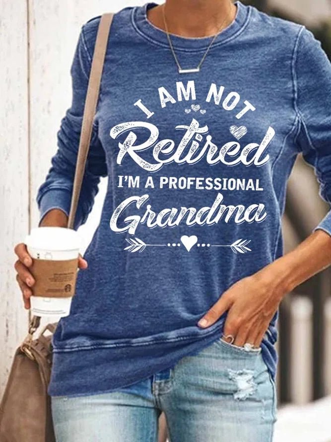 Women's Funny Text Letters I Am Not Retired I Am A Professional Grandma Long Sleeve Crew Neck Sweatshirt
