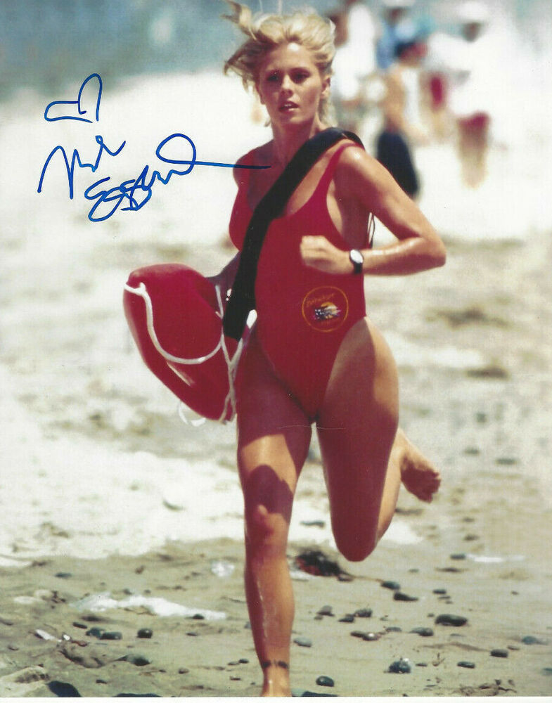 Beautiful Nicole Eggert autographed 8x10 Baywatch color running  on beach Photo Poster painting