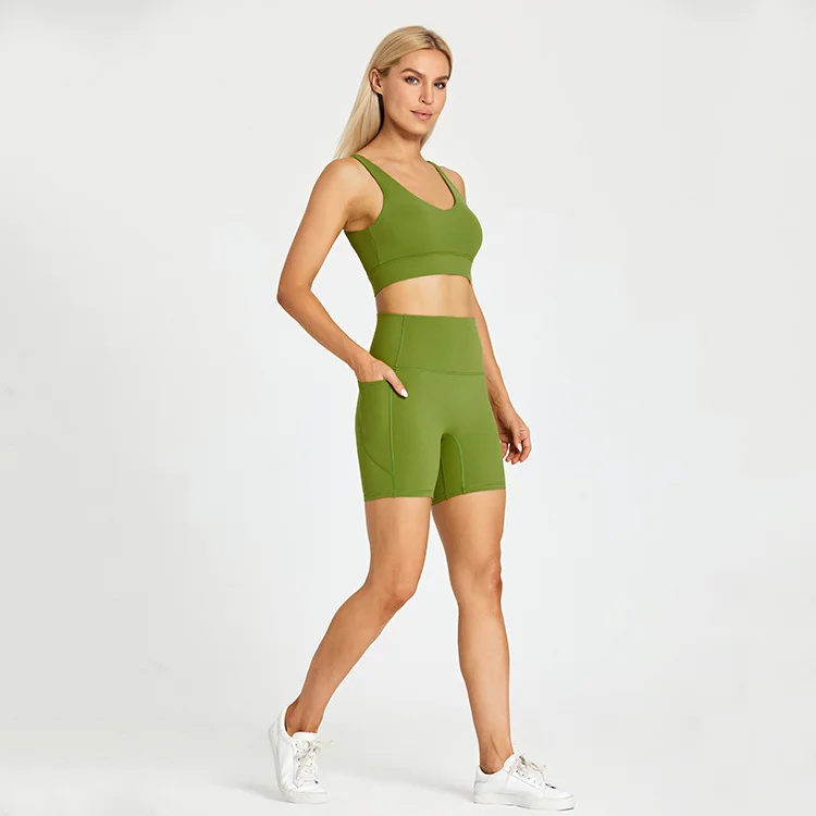 Solid color belt pocket shorts & bra sports suit