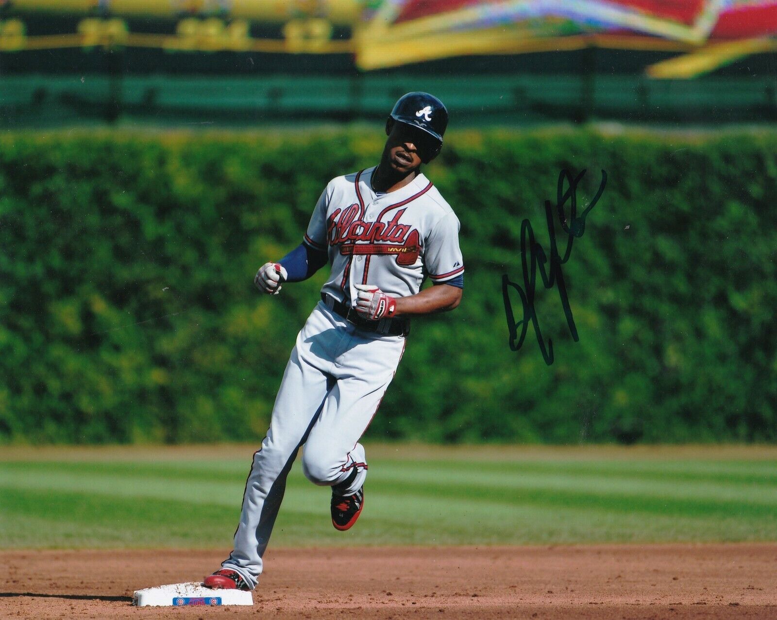 BJ UPTON ATLANTA BRAVES ACTION SIGNED 8x10