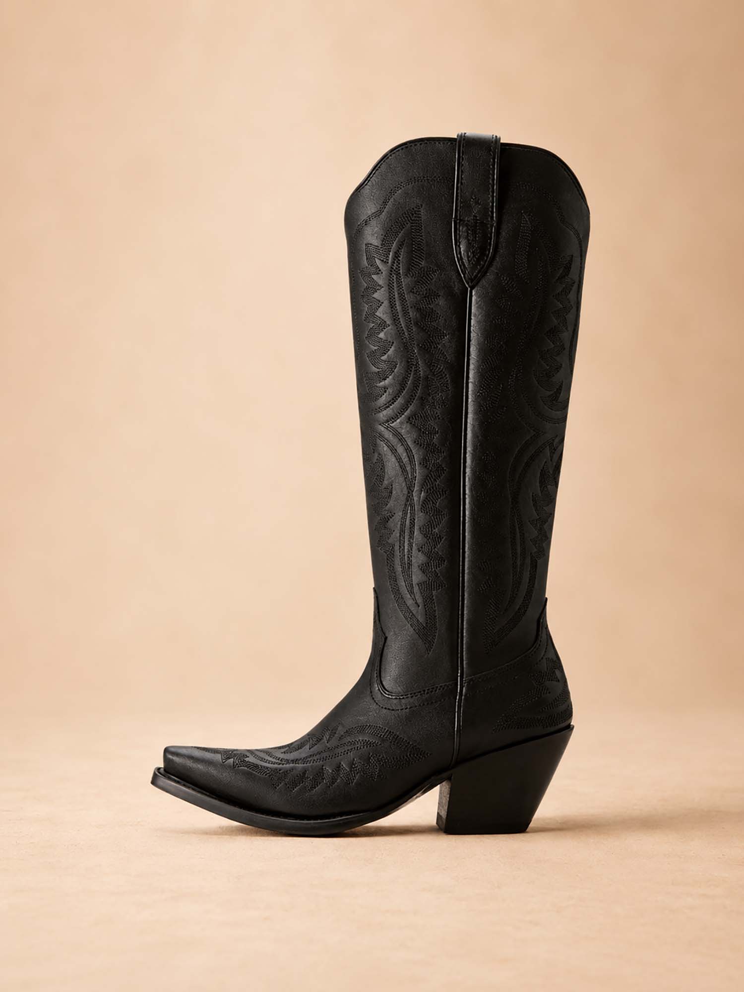 The perfect choice for a country music festival: women's denim boots for Spring/Summer 2026 featuring retro flame and geometric embroidery.