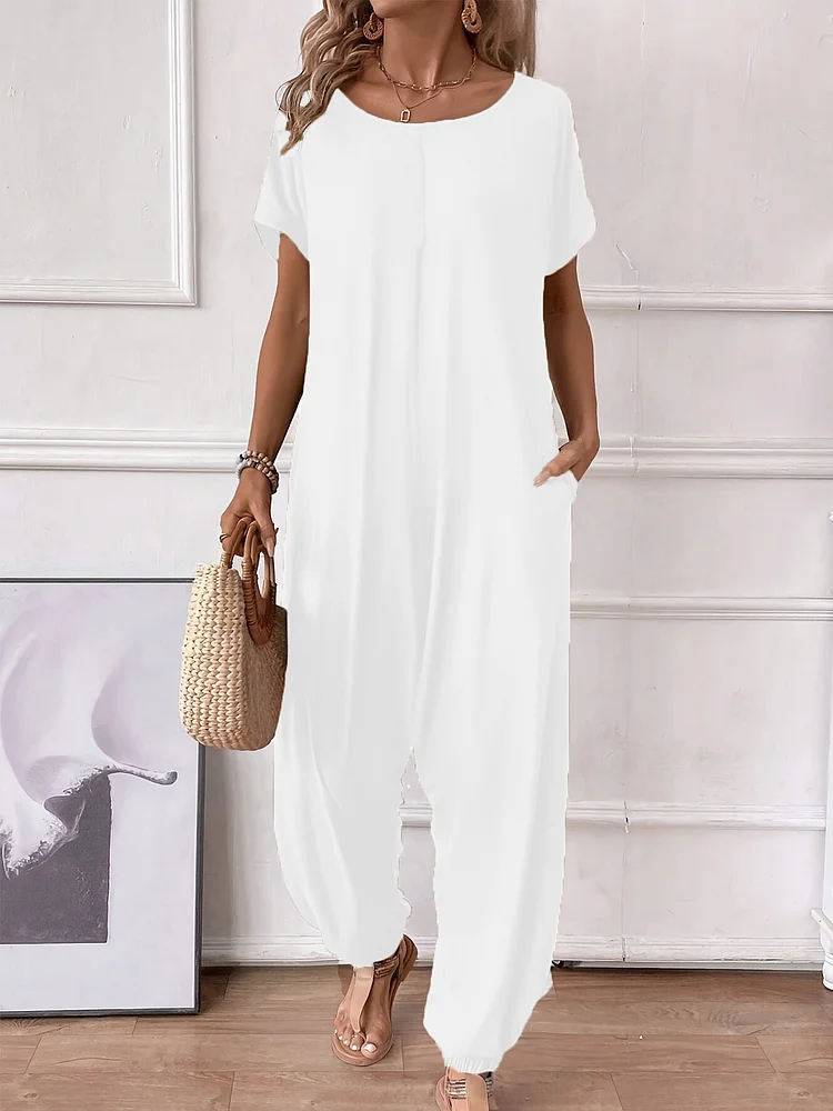 Vibrant Solid Color Short Sleeve Jumpsuit For Women - Casual Baggy Romper With Pocket, Medium Stretch Polyester Fabric, Machine Washable, Perfect For Spring And Summer