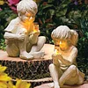 KID WITH FIREFLIES GARDEN LED LIGHTS.
