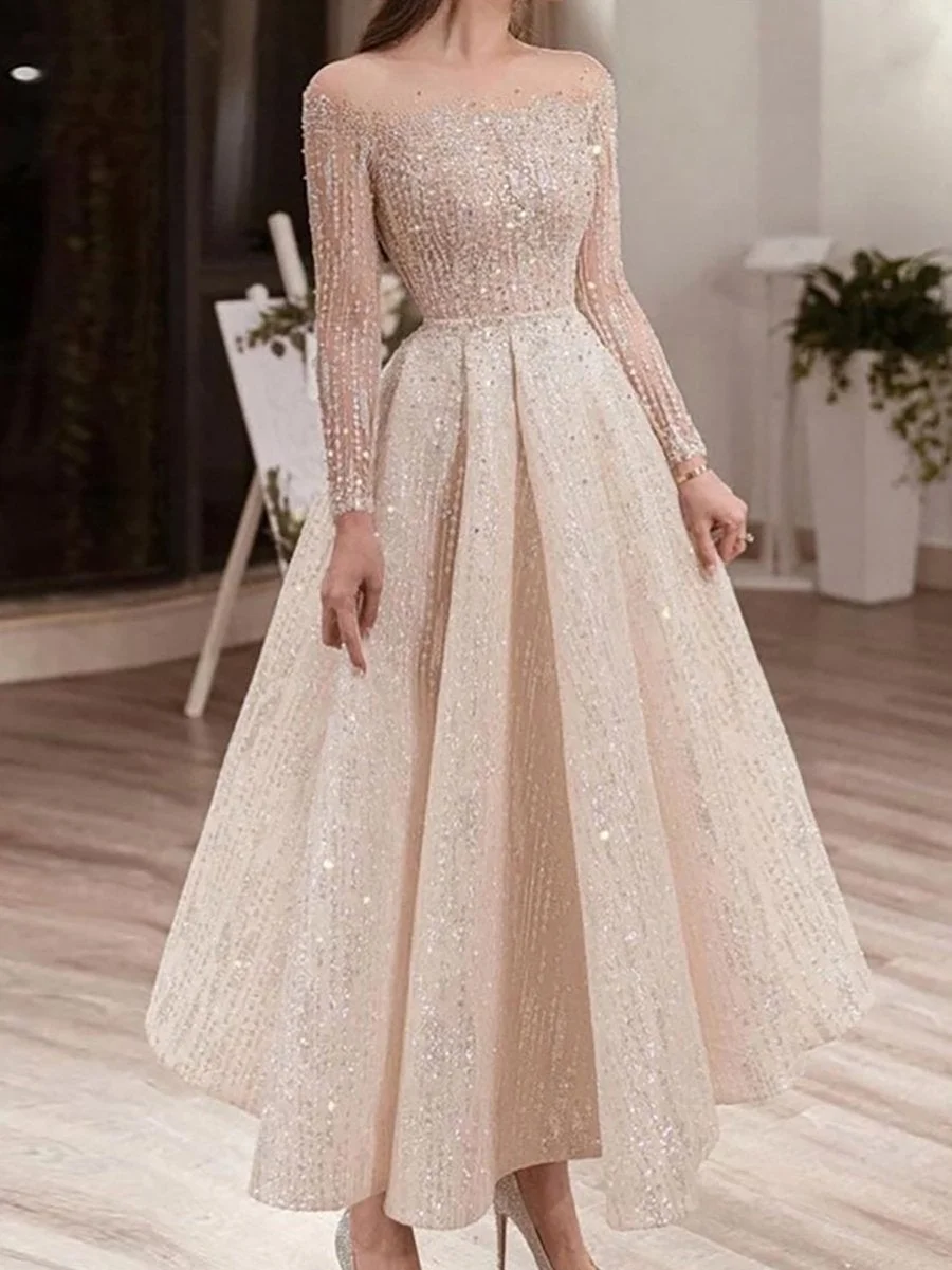 Midi sequined dress with round neck and long sleeves