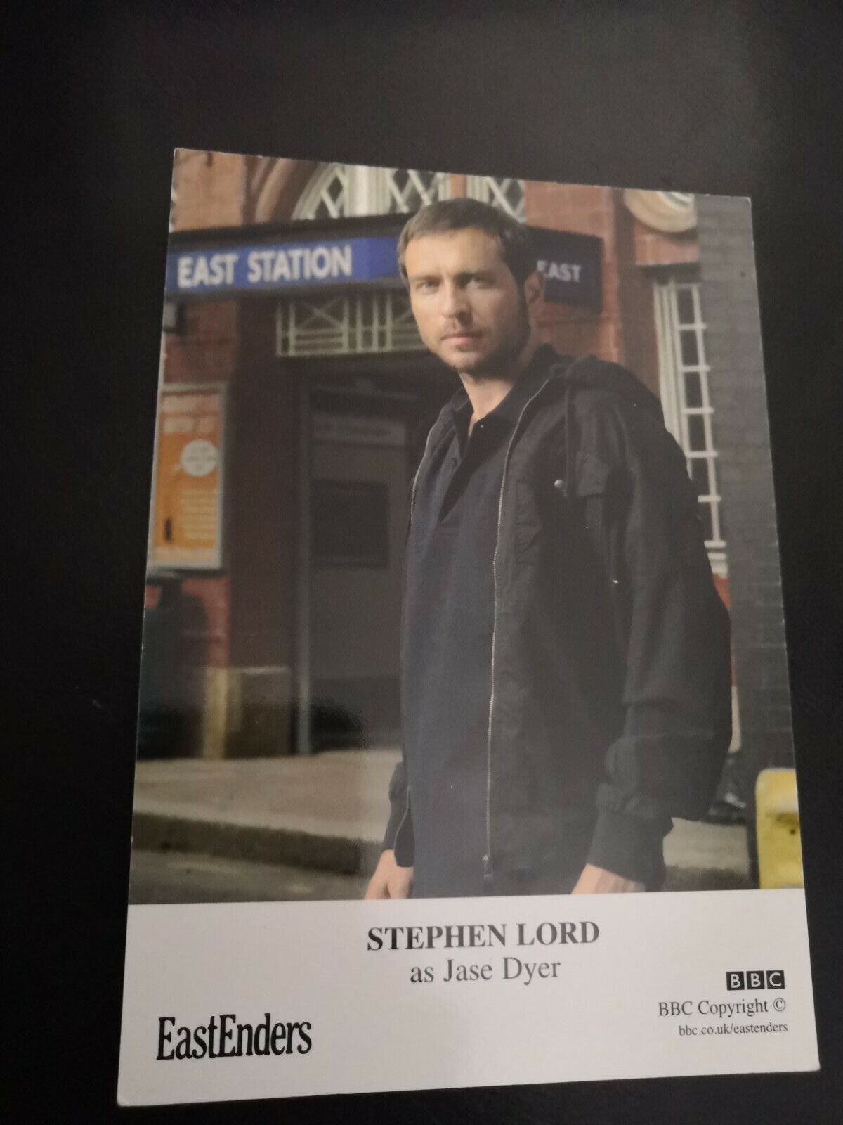 EASTENDERS UNSIGNED CAST CARD OF STEPHEN LORD