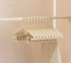 Bold and enlarged high-end thickened anti-shoulder corner household clothes hanging seamless clothes rack integrated