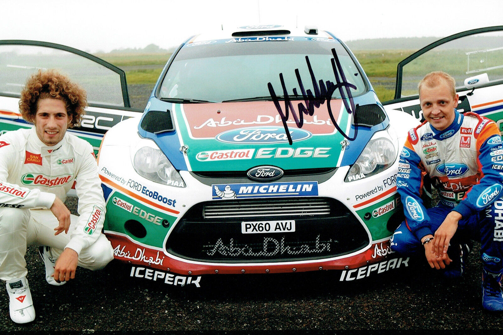 Mikko HIRVONEN WRC SIGNED AUTOGRAPH 12x8 Ford Rally Driver Photo Poster painting AFTAL COA