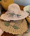 Elegant Crochet Straw Hat with Ruffle Detail