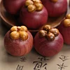 Solid wood mangosteen carving creative hand-held pieces Home desktop small ornaments