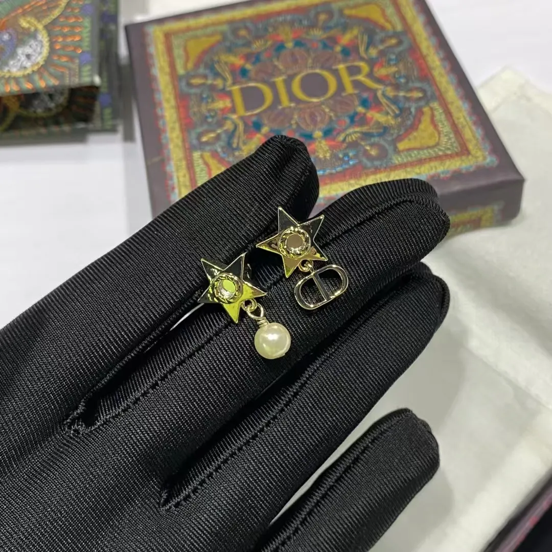 Dior Asymmetric Star Earrings