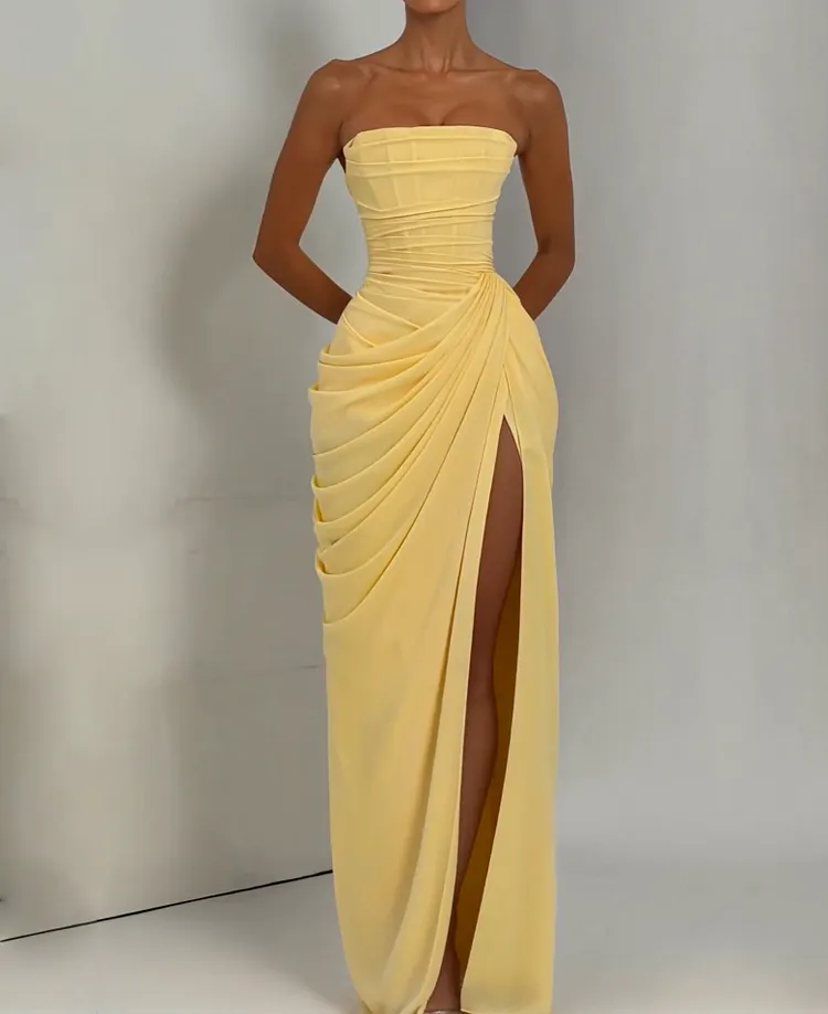 Yellow strapless draped pleated maxi dress