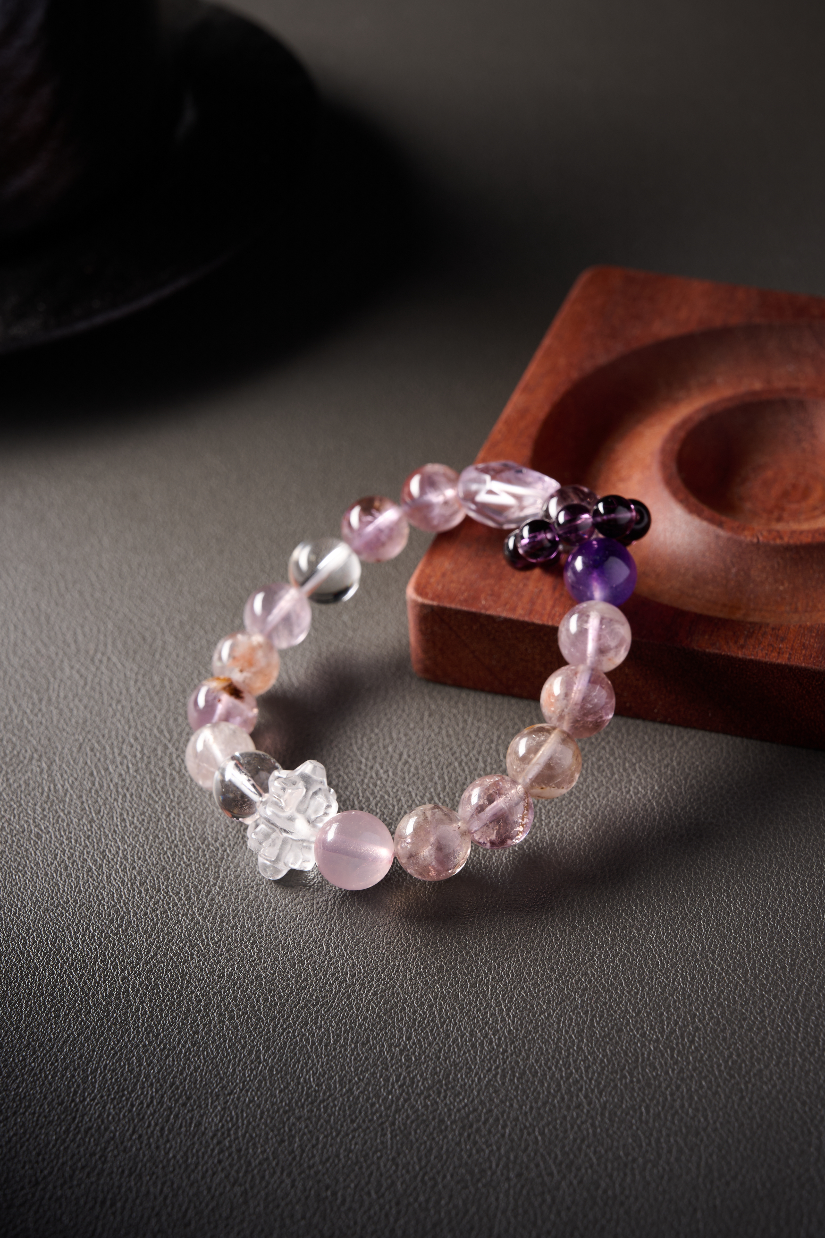 Detail – clear quartz high clarity bead showing crisp transparency and inner reflections.