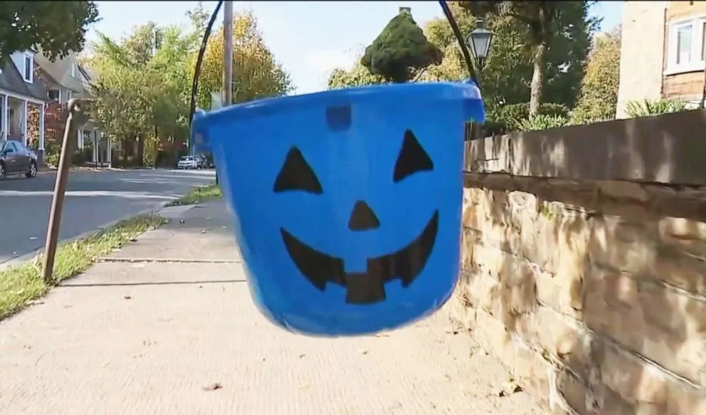 PHOTO: Blue buckets will be carried this Halloween for autism awareness. PHOTO: Blue buckets will be carried this Halloween for autism awareness.