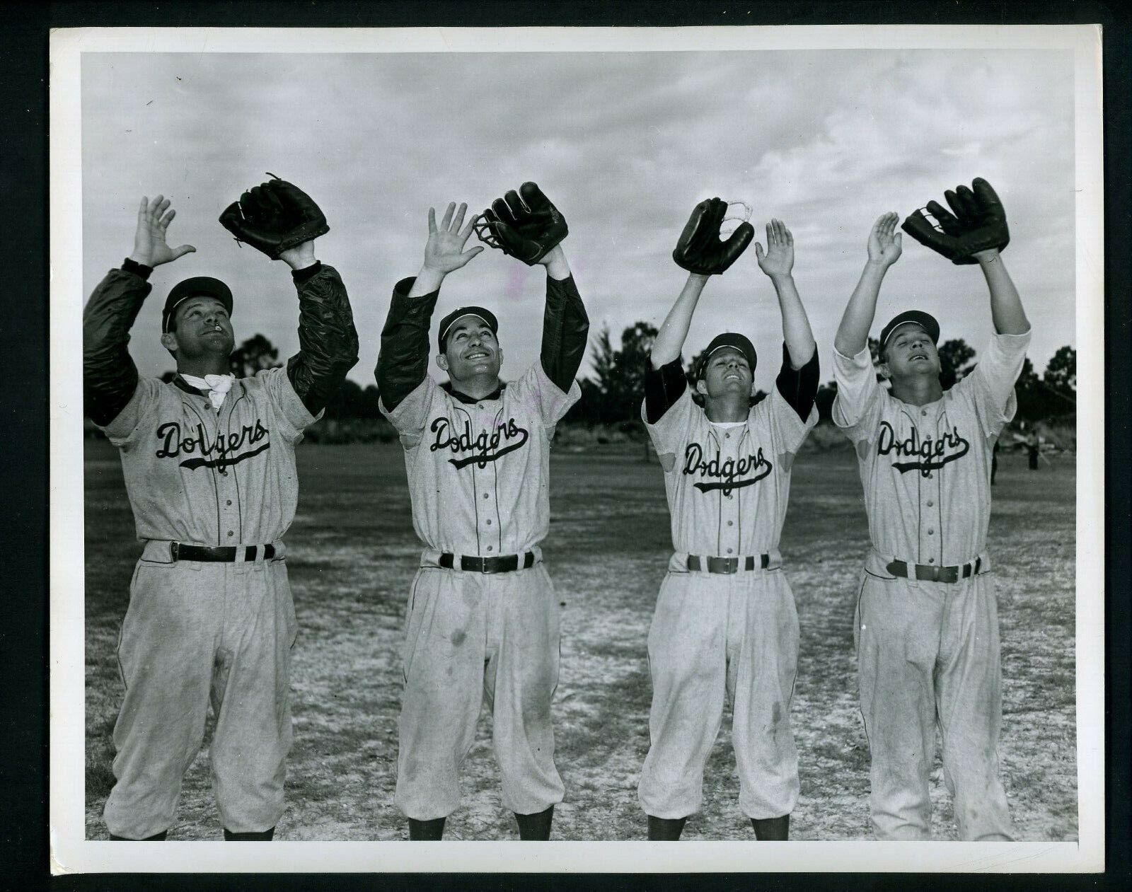 Brooklyn Dodgers McCormick Carl Furillo Marv Rackley Hermanski 1948 Press Photo Poster painting