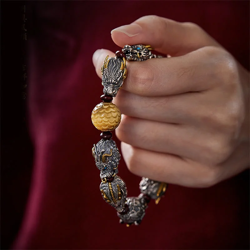 Sandalwood Nine Dragons Head Copper Luck Bracelet