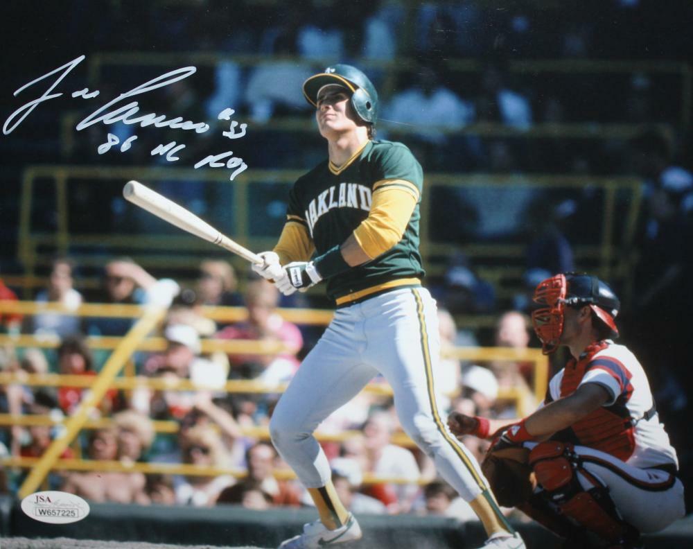 Jose Canseco Autographed *White 8x10 Swinging Photo Poster painting W/ 86 AL ROY- JSA W Auth