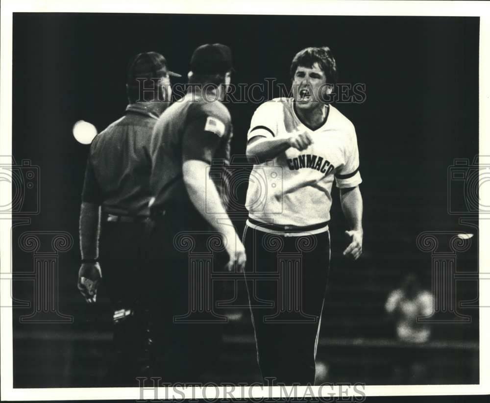 Press Photo Poster painting Conmaco baseball manager Pat O'Shea gestures while arguing with ump