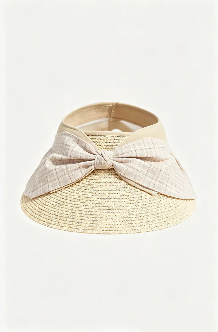 Open-top sun hat with plaid paneling, side buckle, and bow detail.