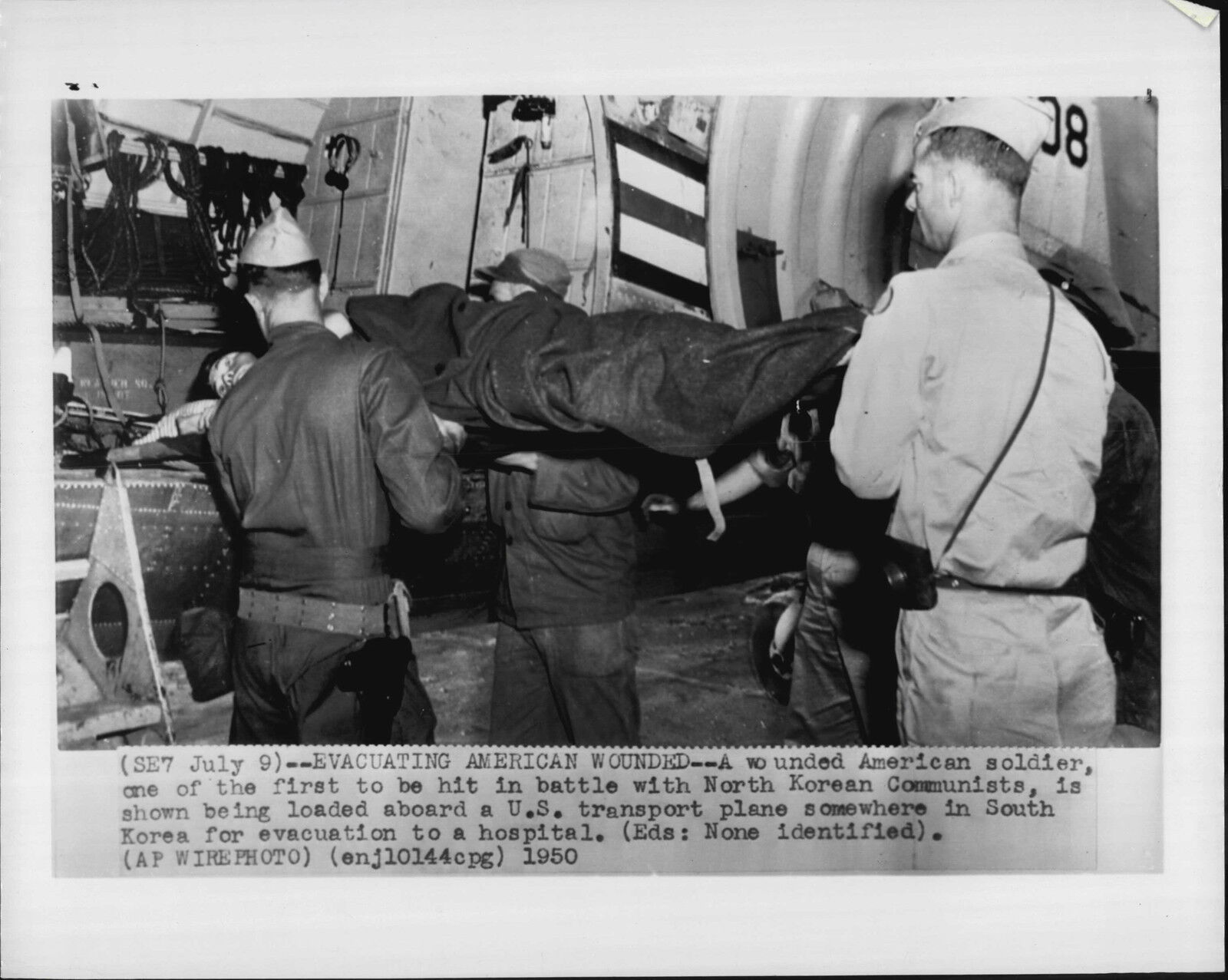 Wounded American Loaded Aboard C-47 Transport Plane 1950 Korean War Press Photo Poster painting