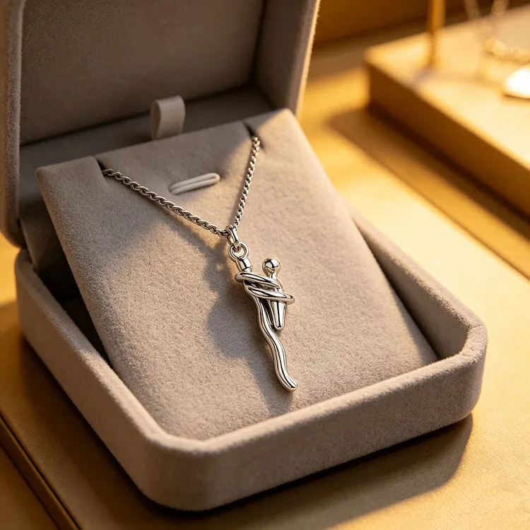 hugging figure pendant 