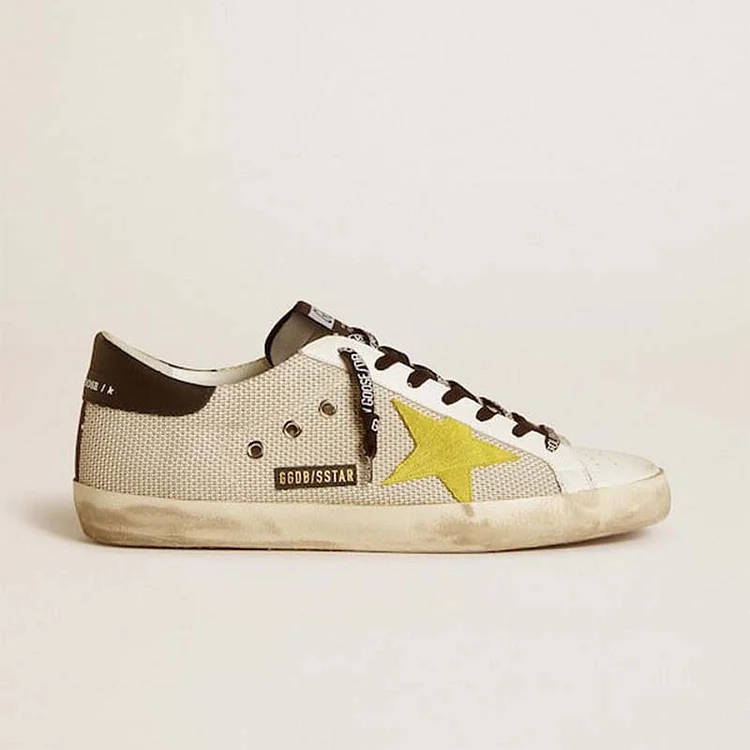 Golden Goose Super-Star de malla con estrella de ante amarilla y refuerzo del talón de cuero negro