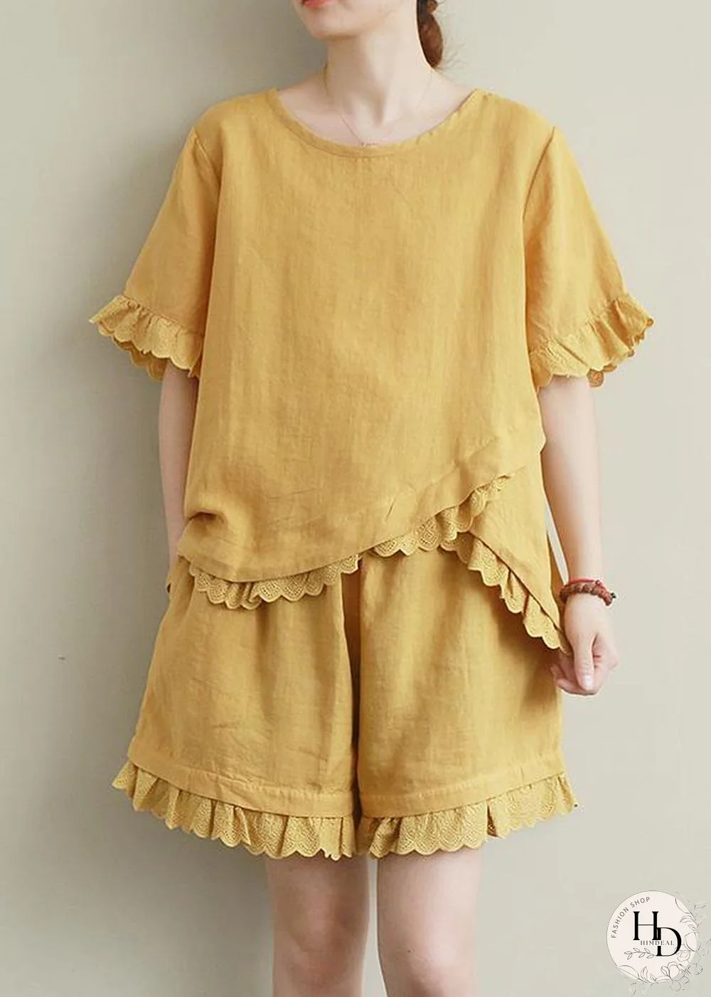Literary yellow suit lace lace irregular round neck short sleeve shorts two-piece suit