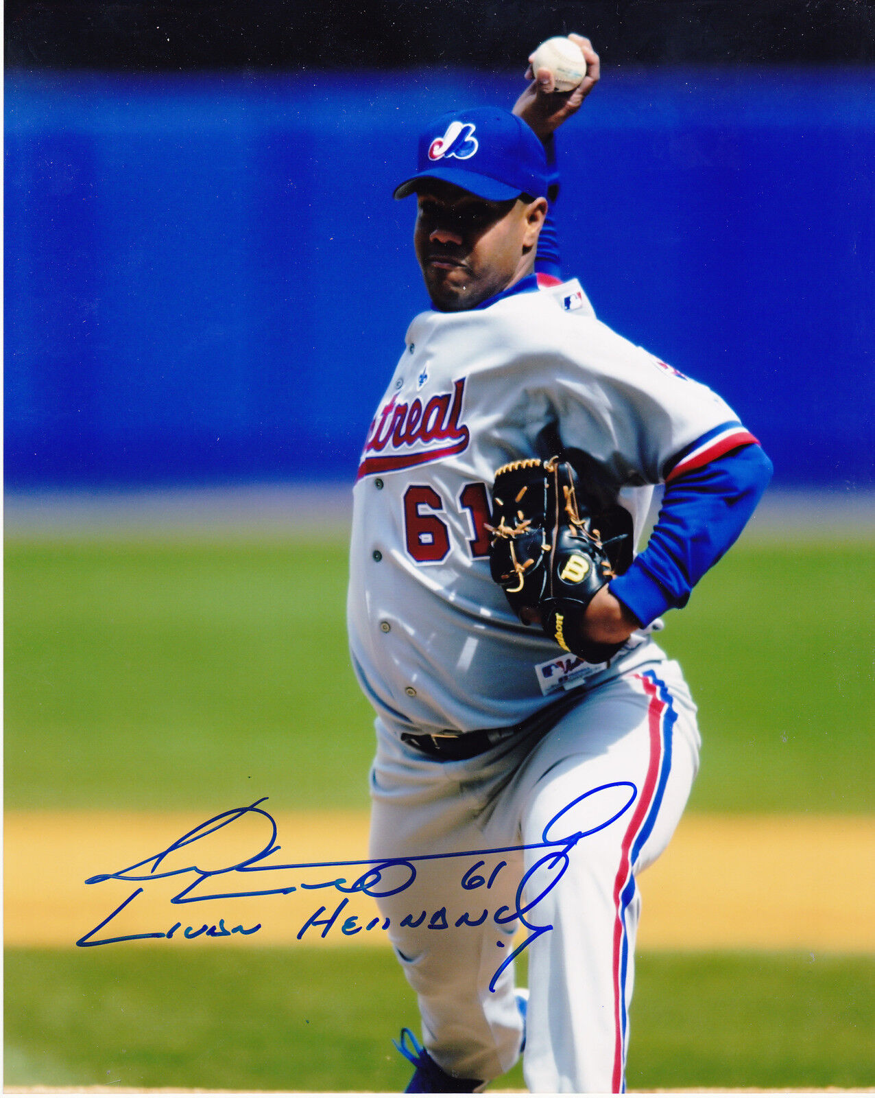 LIVAN HERNANDEZ MONTREAL EXPOS ACTION SIGNED 8x10