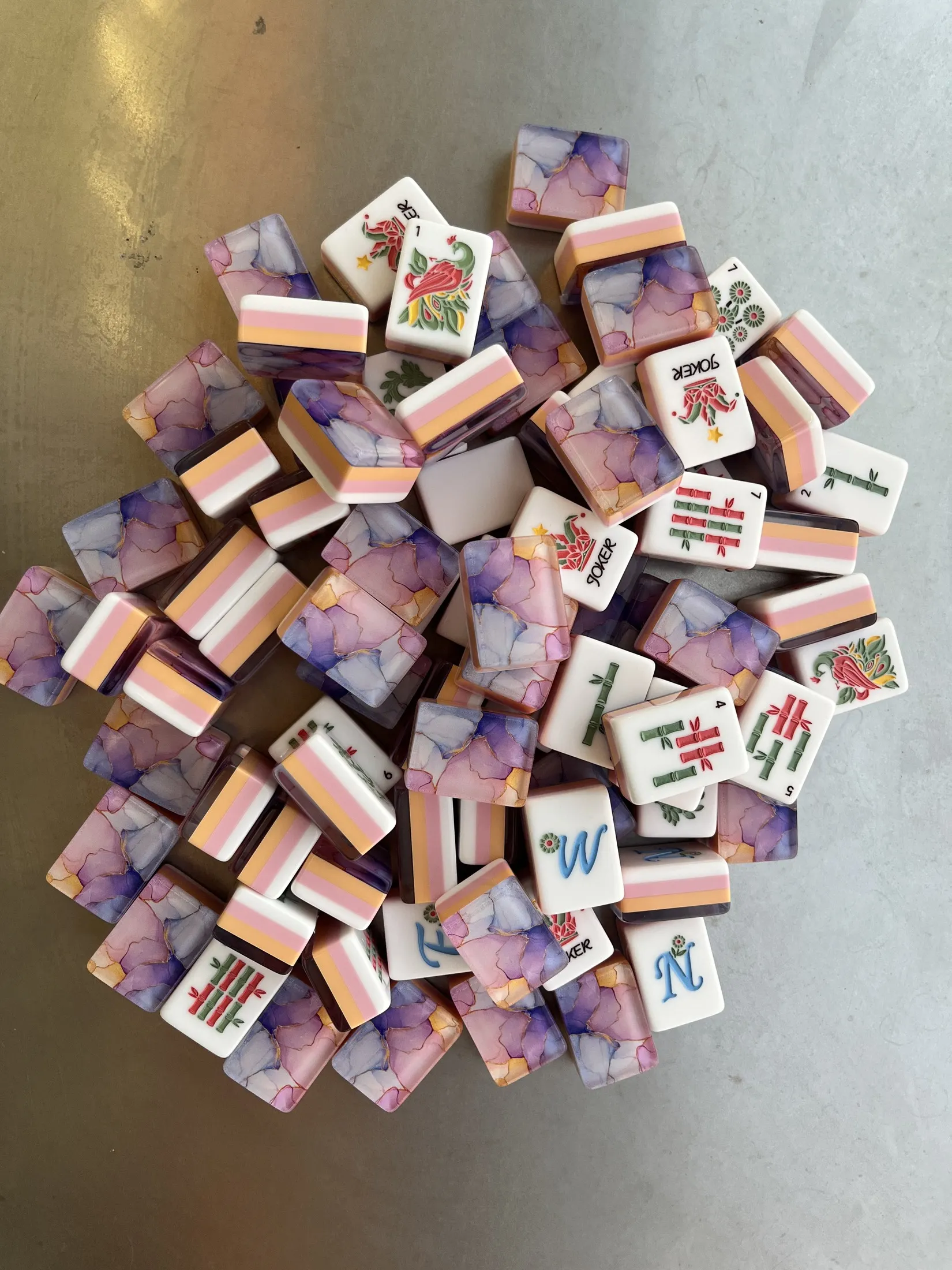 Authentic Purple Cloud Fairy backs paired with engraved faces.