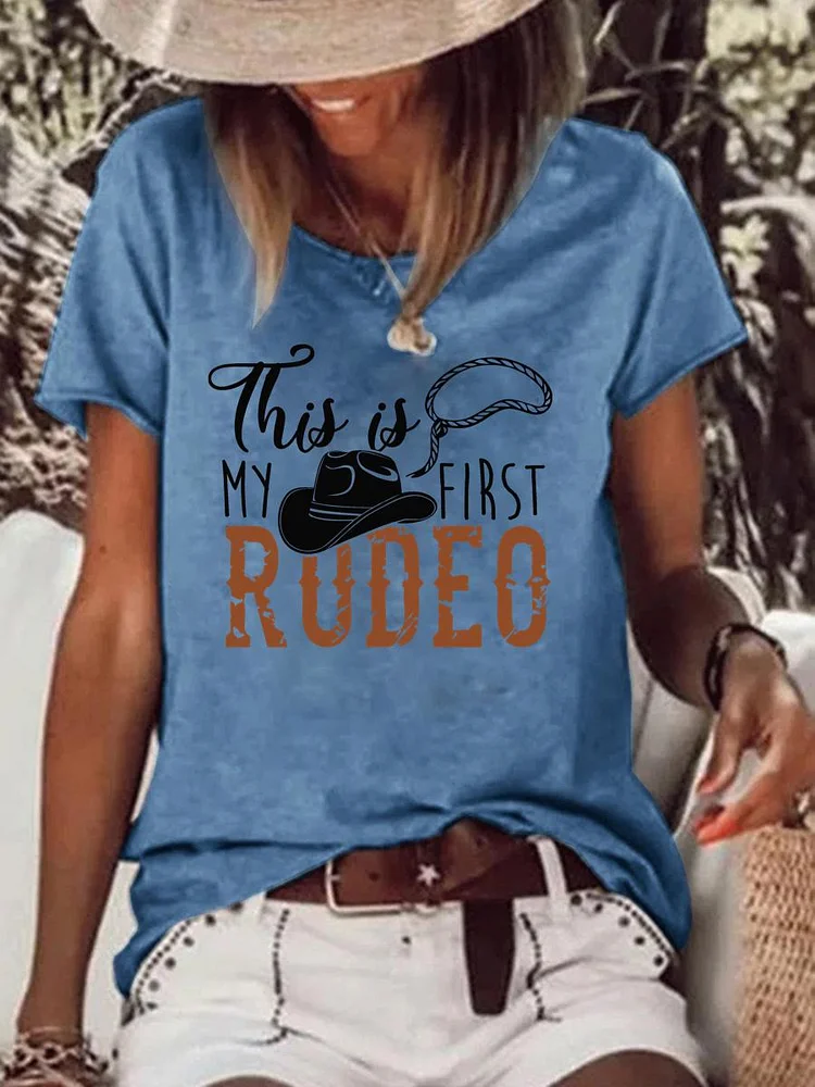 This is my first rudeo village life Raw Hem Tee