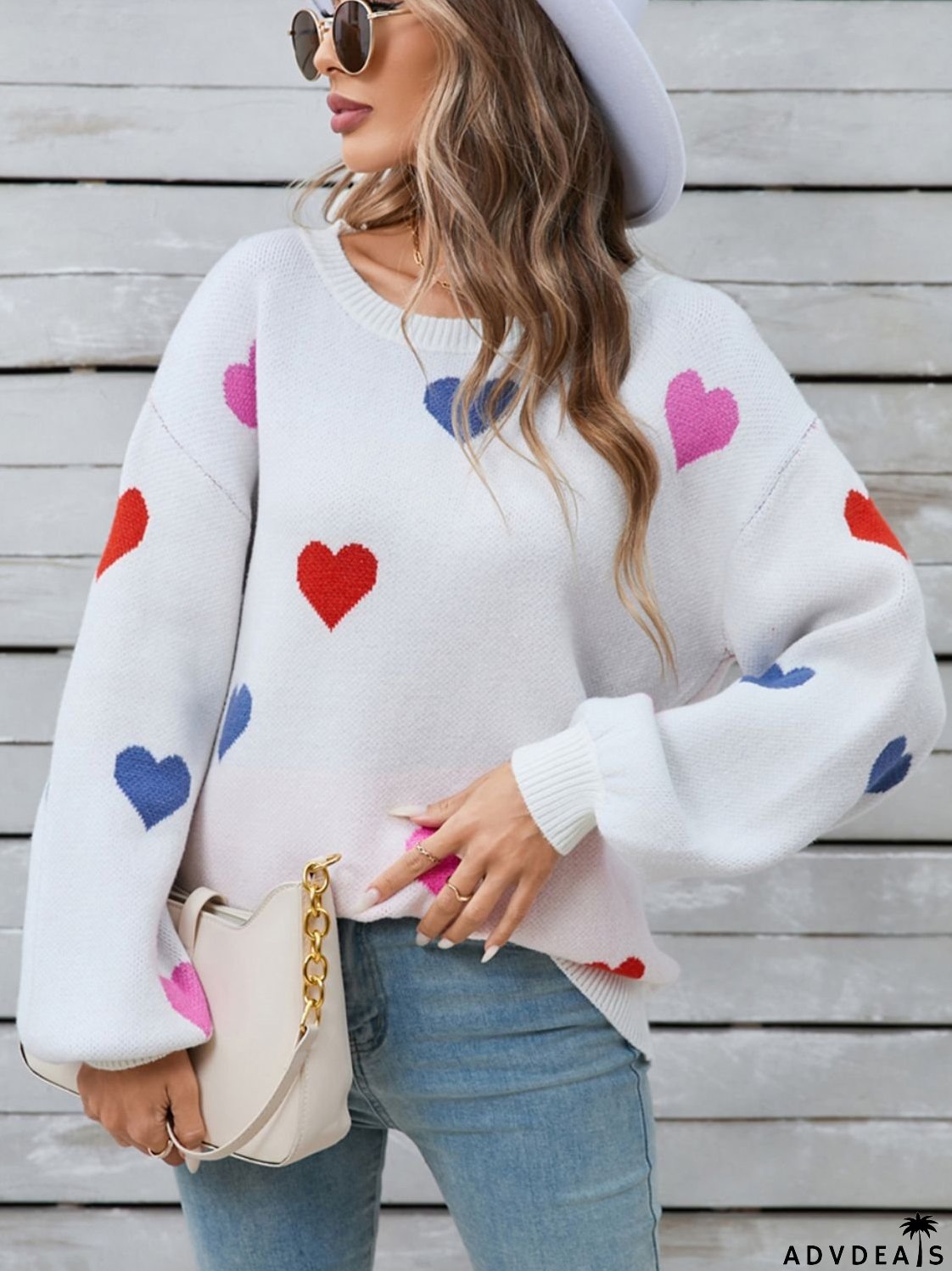 Heart-shaped, long-sleeved crew neck sweater